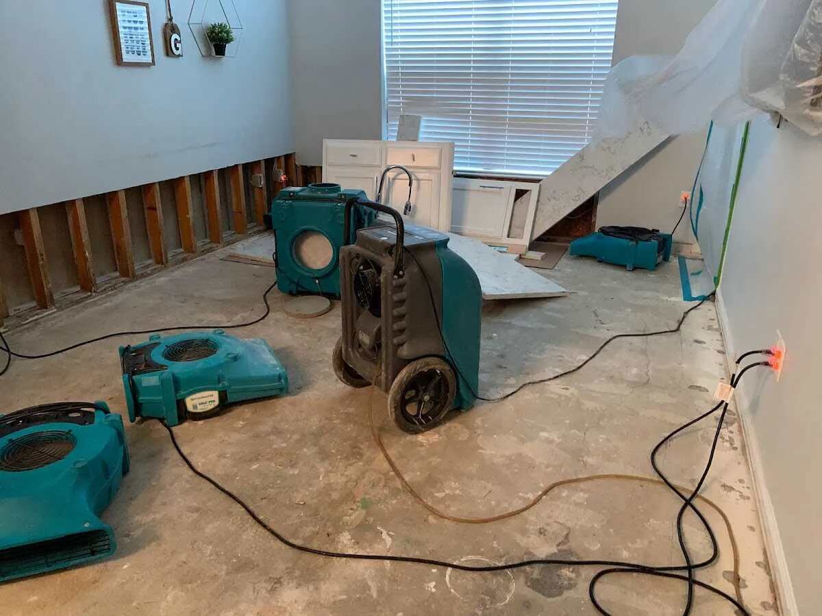 Dehumidifier in flood-cut room for Water Damage Restoration in Farmersville